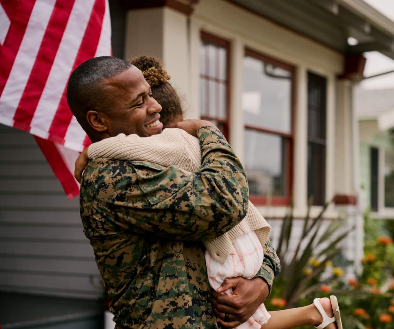 Military member coming home to his family in his VA loan funded home
