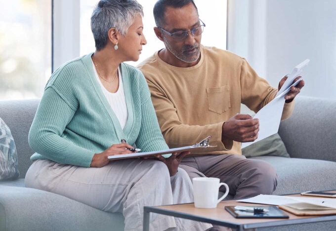 A couple working on their mortgage.